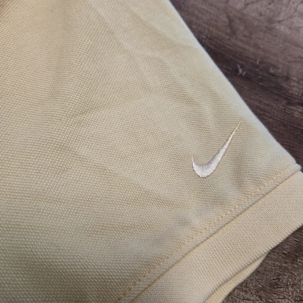 Nike Men's Golf Polo Shirt Light Yellow with Blue Embroidered Clubs Size Large